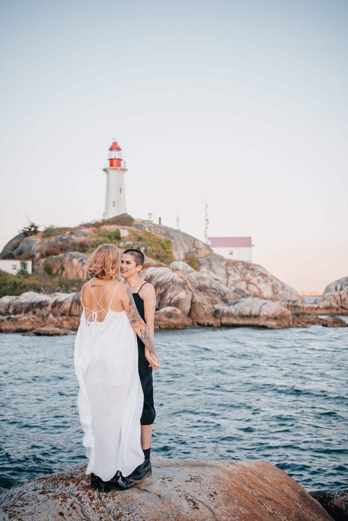 elopement couple on wedding day near lighthouse