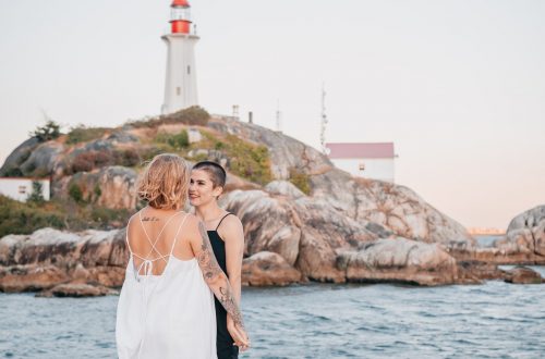elopement couple on wedding day near lighthouse