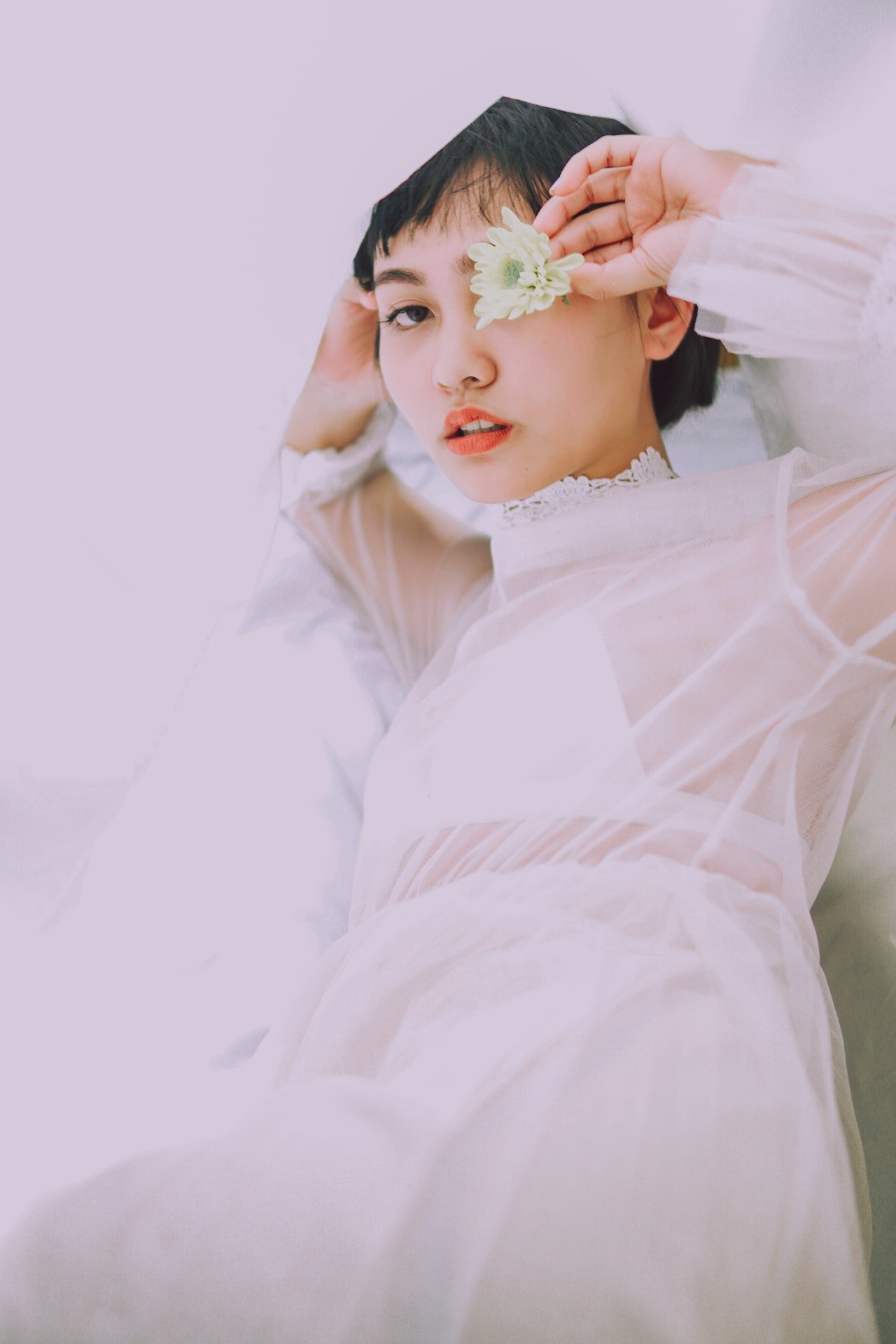 asian bride with short hair in wedding dress